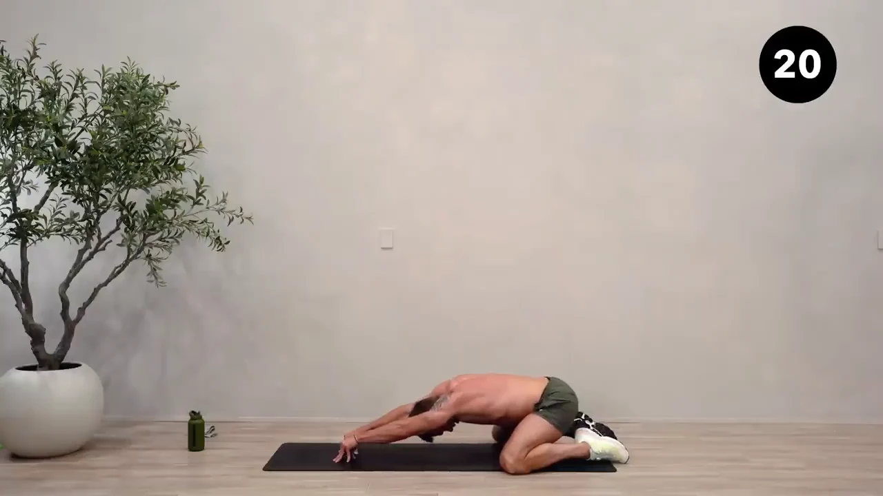 Dan the HIIT Man demonstrating child’s pose.