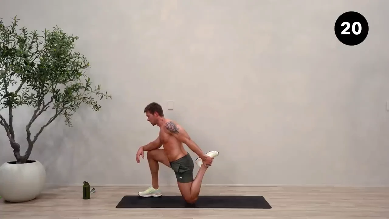 Dan the HIIT Man demonstrating kneeling quad stretch — side 2.