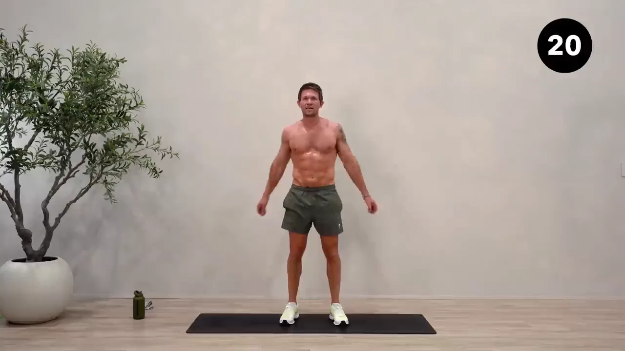 Dan the HIIT Man demonstrating shoulder rolls.