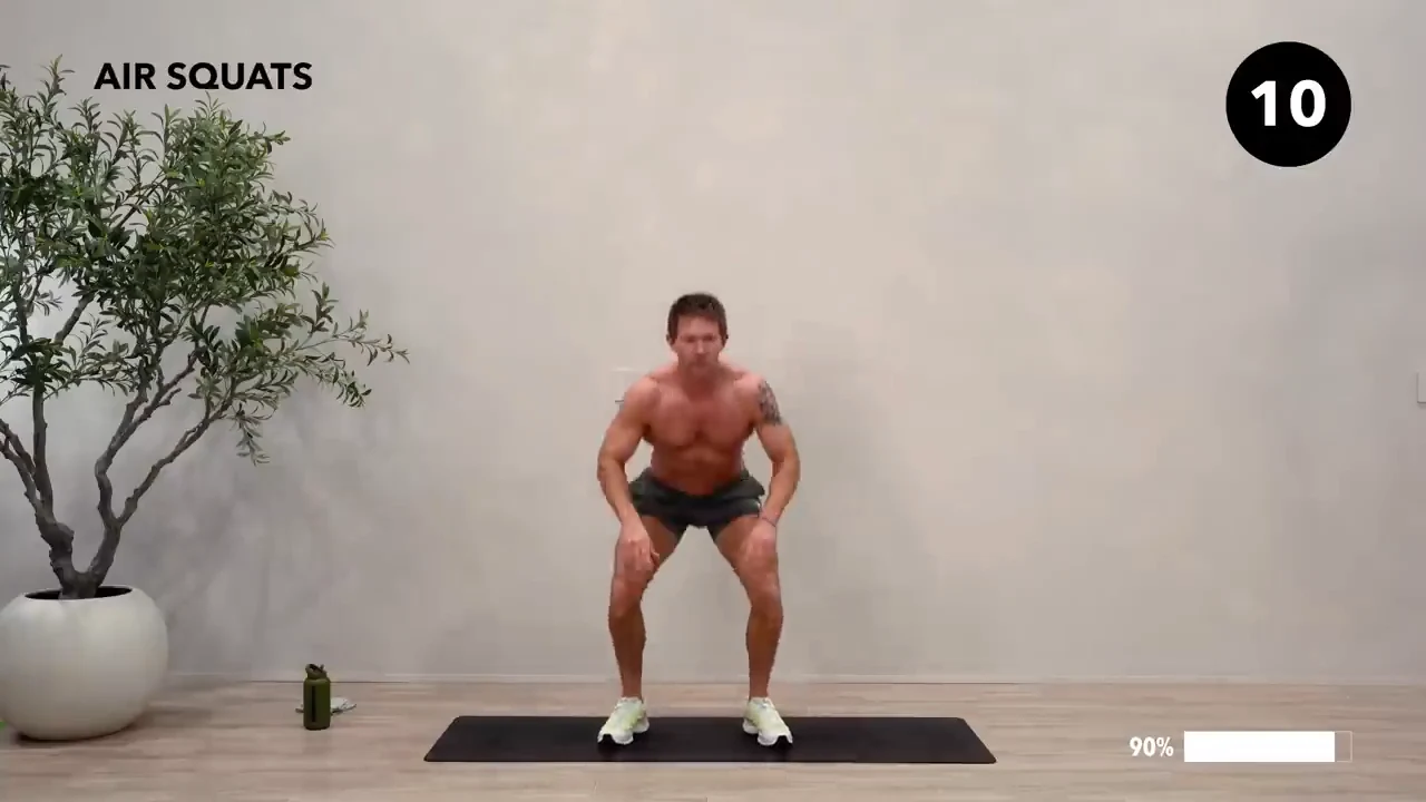 Dan the HIIT Man demonstrating air squats.