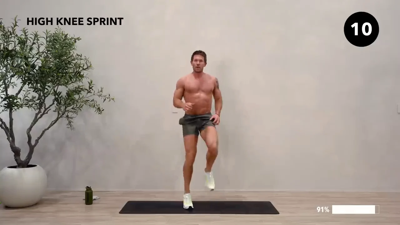 Dan the HIIT Man demonstrating high knee sprint.