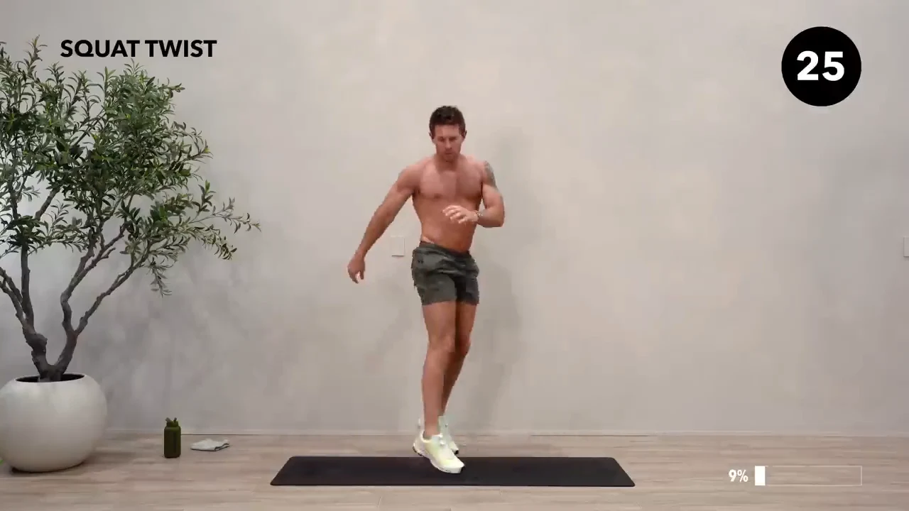 Dan the HIIT Man demonstrating squat twist.