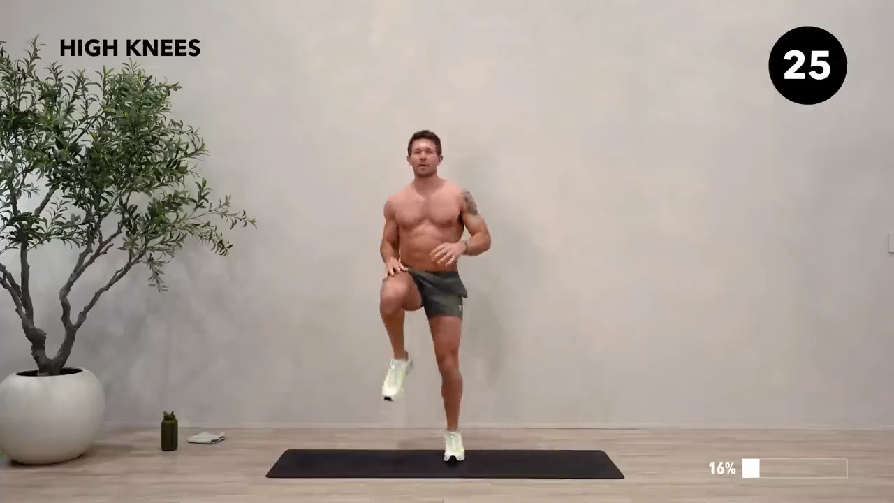 Dan the HIIT Man demonstrating high knees.