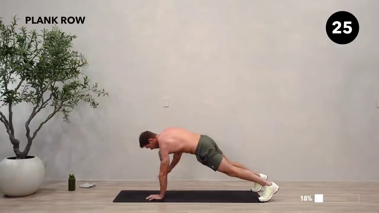 Dan the HIIT Man demonstrating plank row.