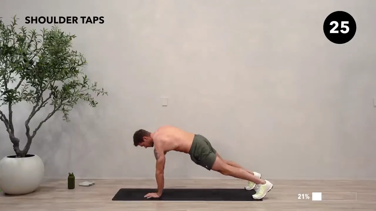 Dan the HIIT Man demonstrating shoulder taps.
