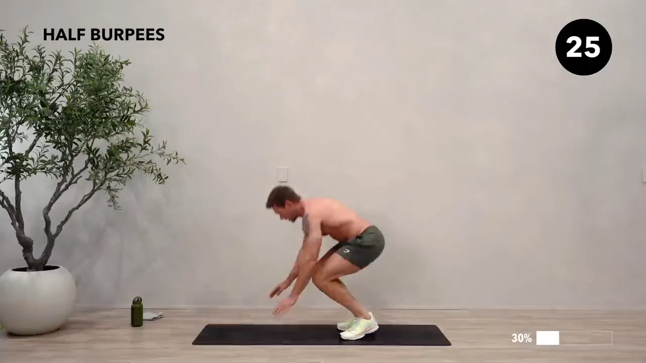 Dan the HIIT Man demonstrating half burpees.