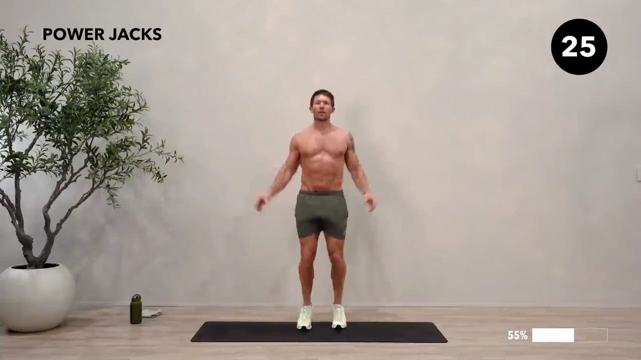 Dan the HIIT Man demonstrating power jacks.