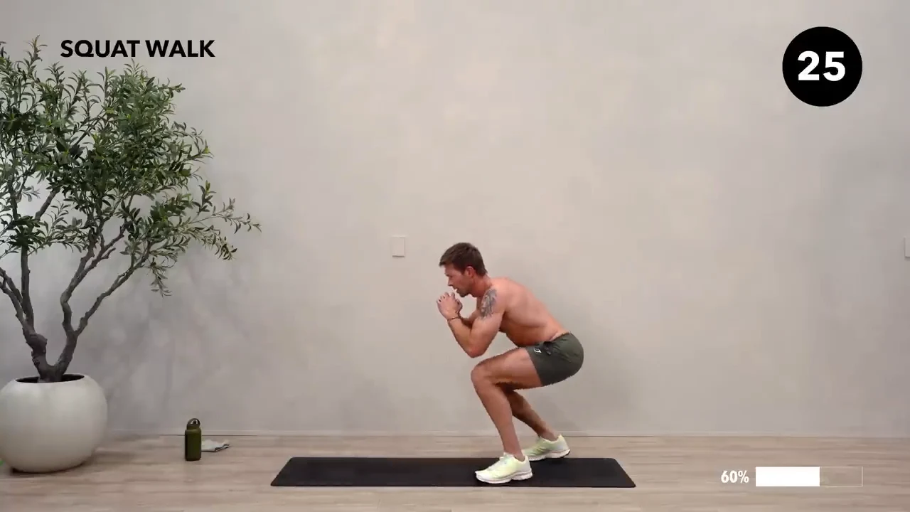 Dan the HIIT Man demonstrating squat walk.