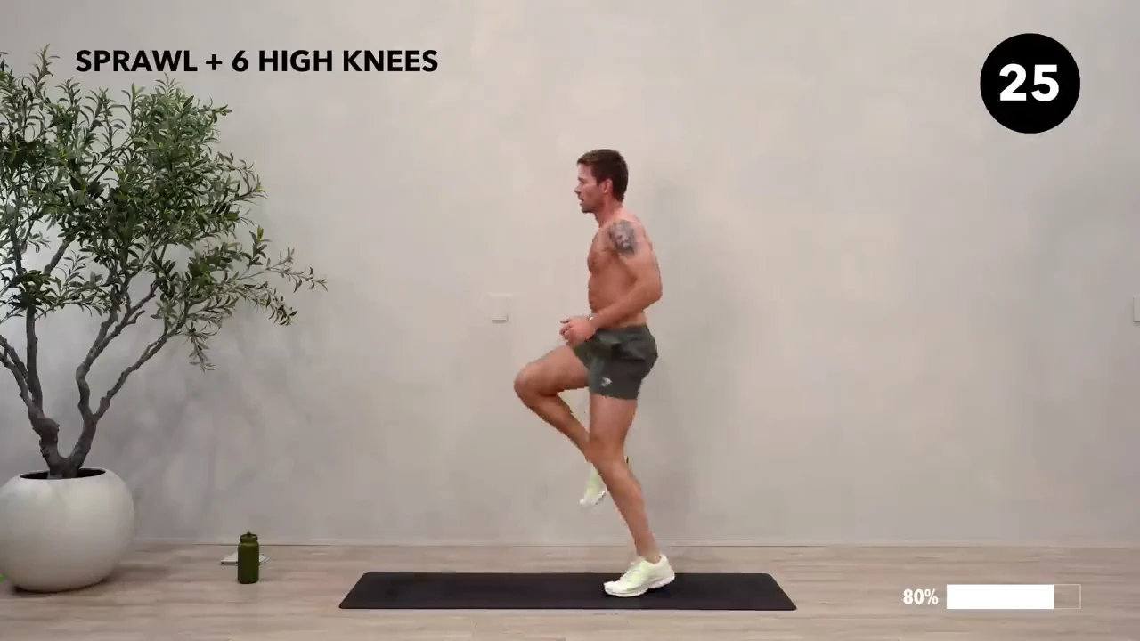 Dan the HIIT Man demonstrating sprawl + 6 high knees.