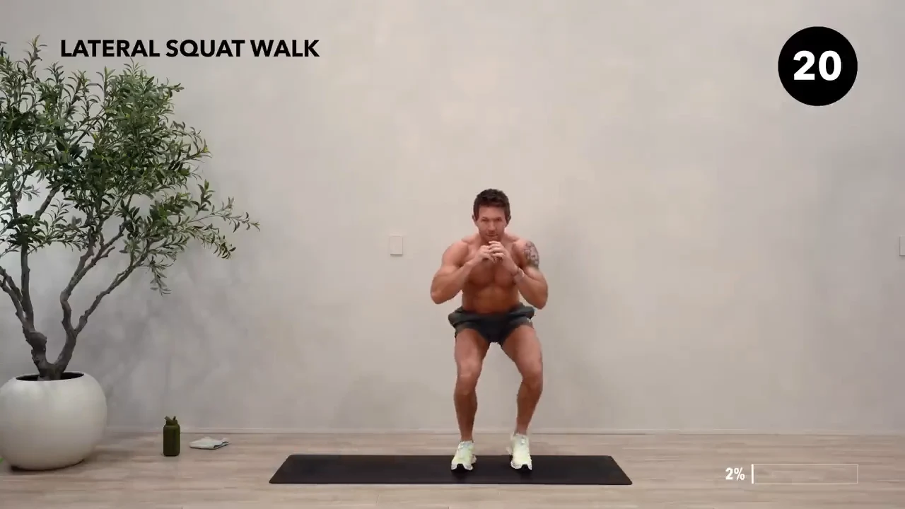Dan the HIIT Man demonstrating lateral squat walk.